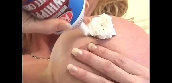  Playful blonde floozie Plenty UpTopp is fond of covering her body with chocolate syrup and ready whip stuff before her lover  fucks her huge melons and wet cunt